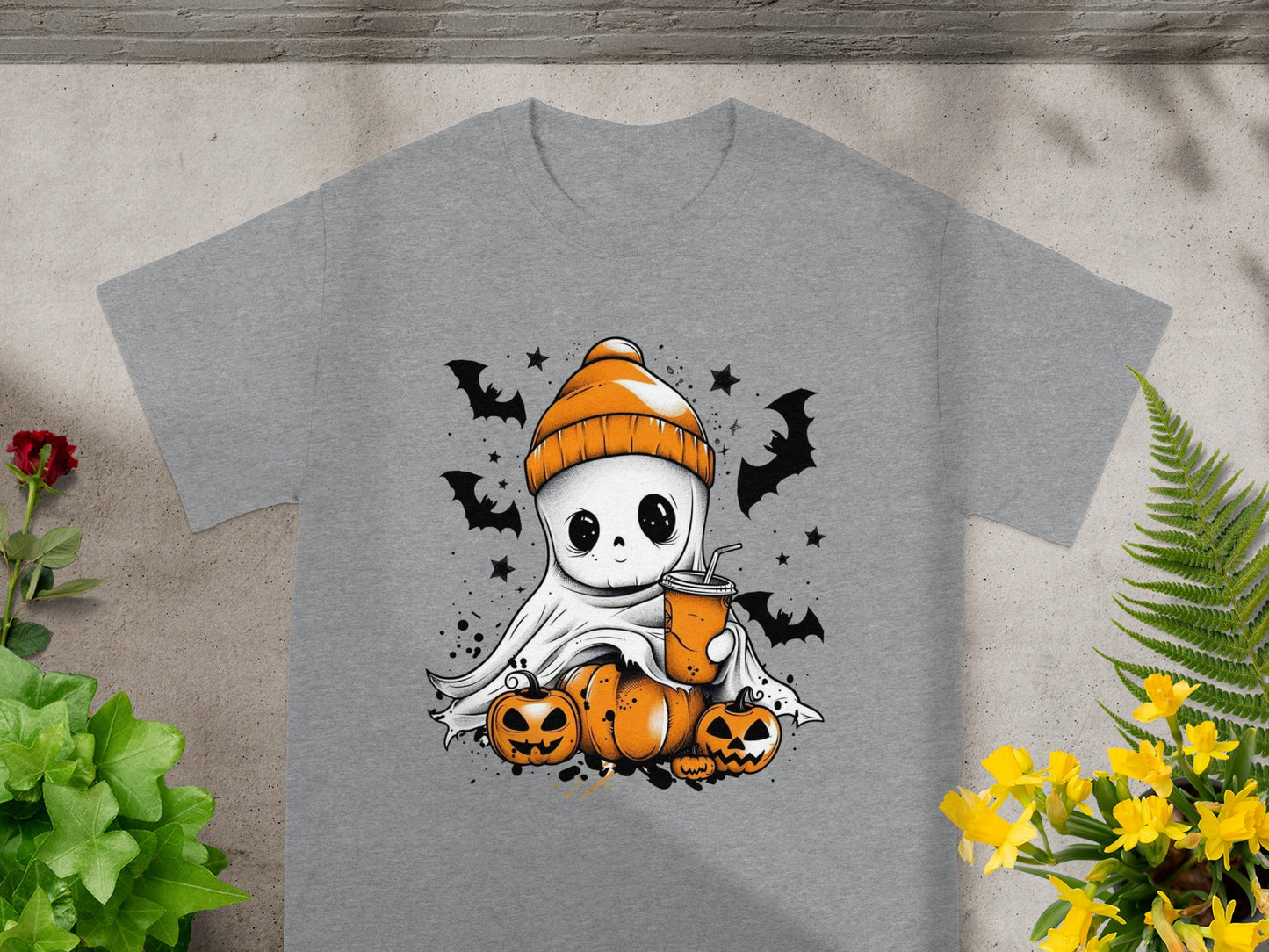 Cute ghost with drink and pumpkins on a gray t-shirt, surrounded by bats.