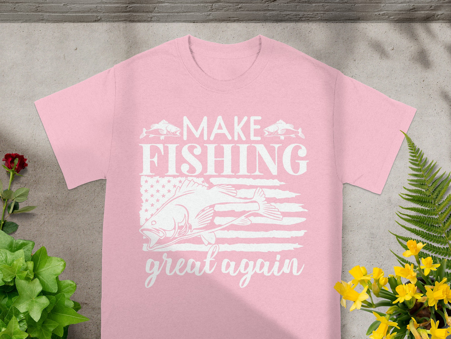 Pink t-shirt with "MAKE FISHING great again" text and a fish on American flag.