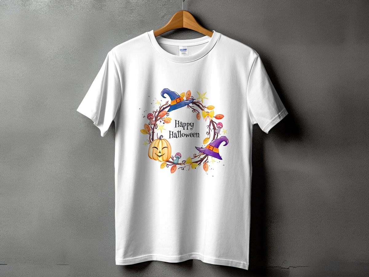 White t-shirt with a watercolor Halloween wreath featuring a pumpkin and witch hats.