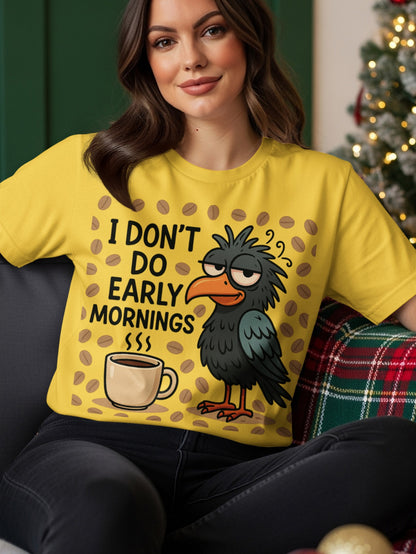 Yellow t-shirt with black bird and coffee mug graphic, "I DON'T DO EARLY MORNINGS" text.