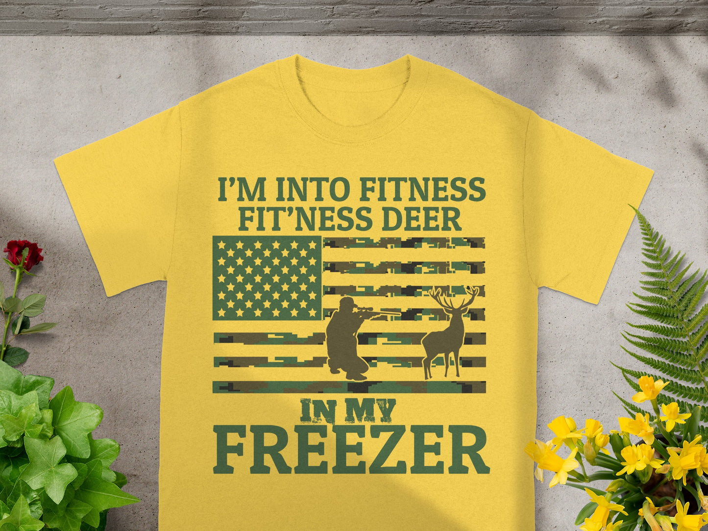 Yellow t-shirt with "I'm Into Fitness Fit'ness Deer In My Freezer" text and hunting graphics.