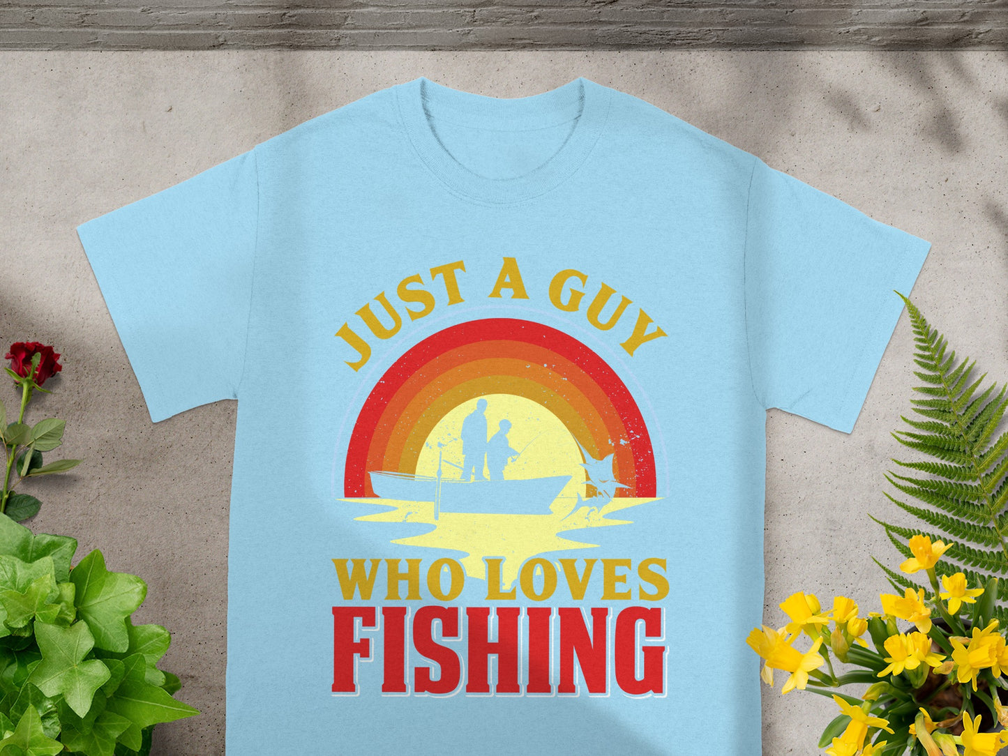 Light blue t-shirt with graphic "JUST A GUY WHO LOVES FISHING".