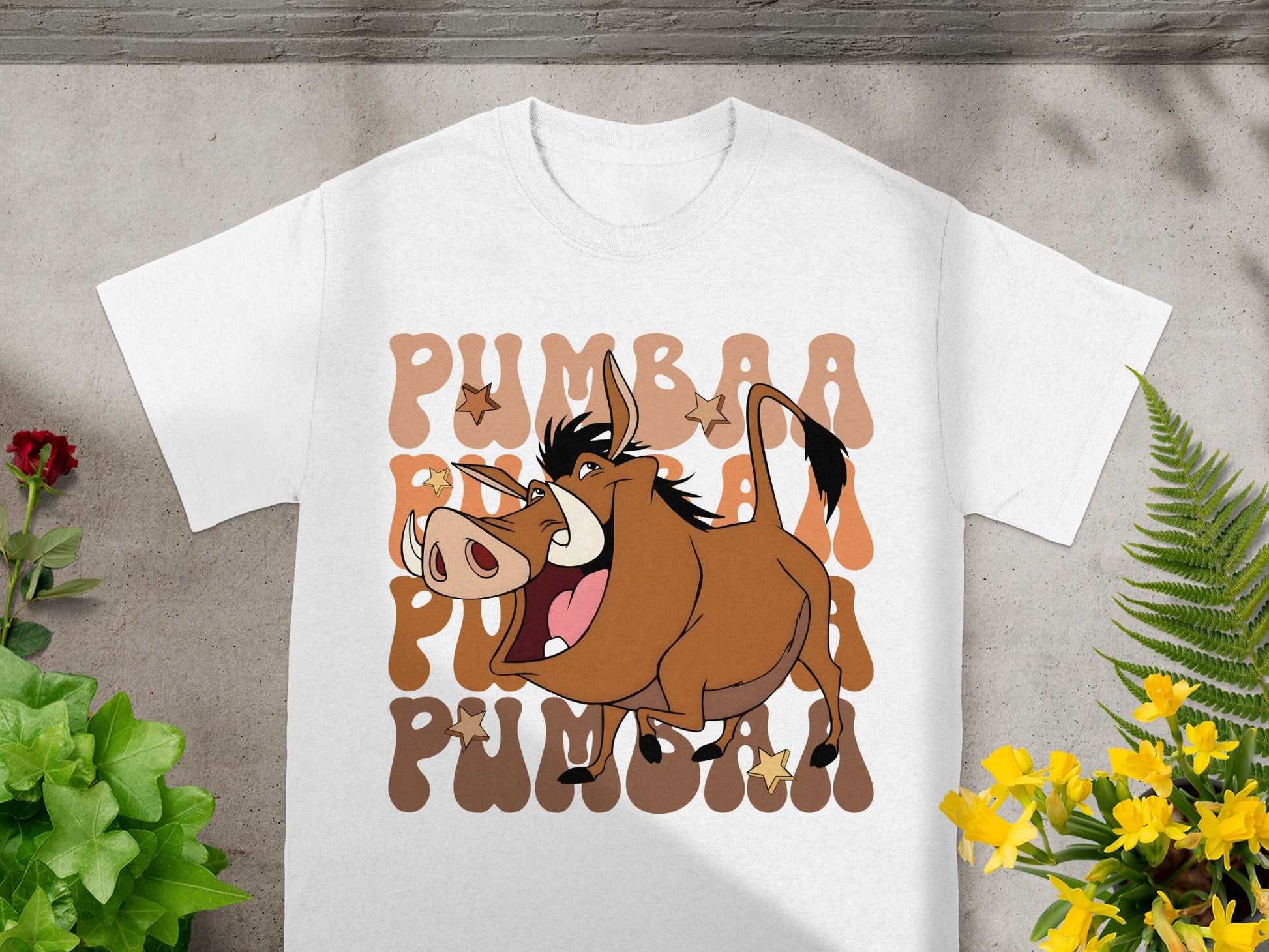 Pumbaa the warthog character from The Lion King on a white t-shirt.