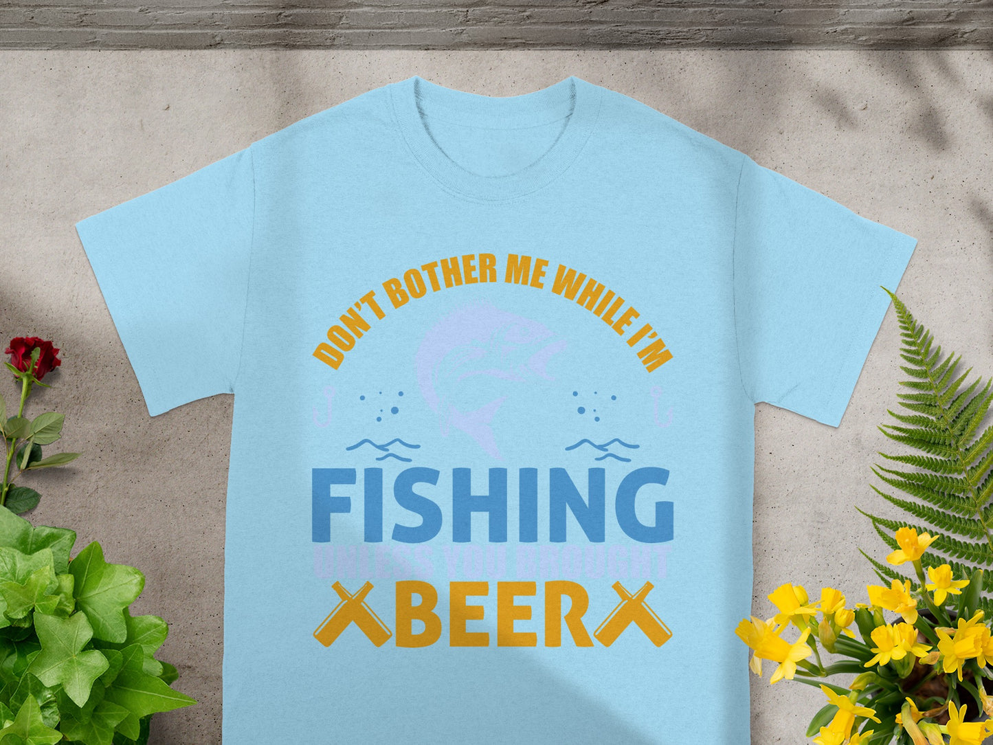 Light blue t-shirt with "Don't Bother Me While I'm Fishing" and "Beer" graphics.