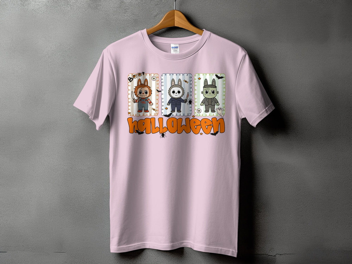 Pink t-shirt with cartoon Chucky, Michael Myers, and Frankenstein characters with "Halloween" text.