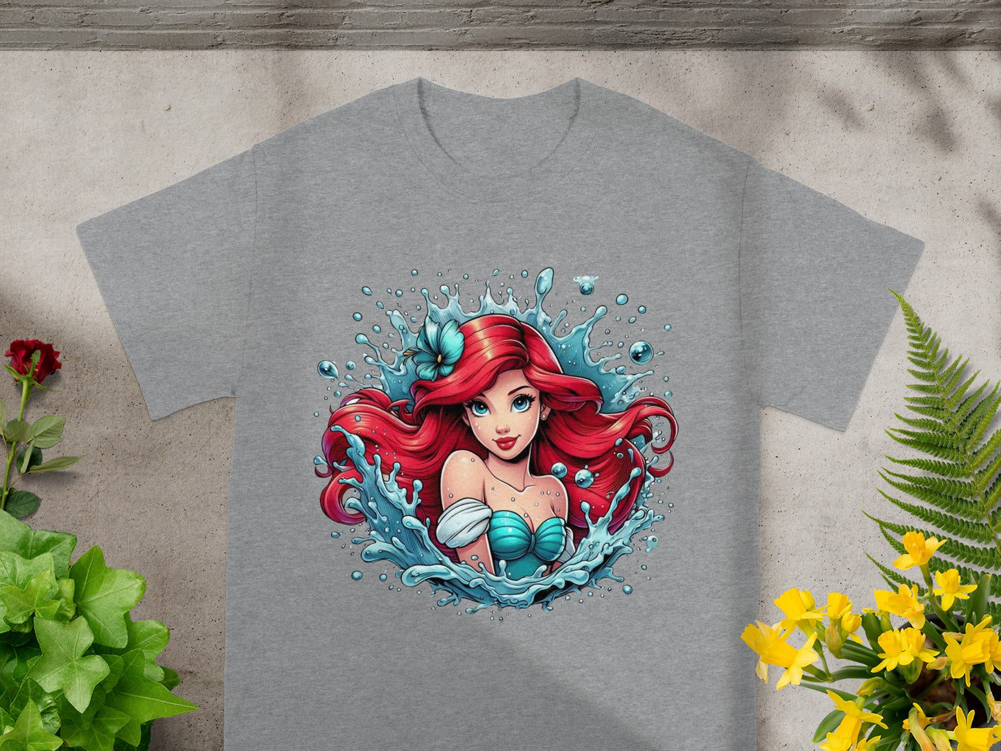 Ariel from The Little Mermaid emerging from splashing water.