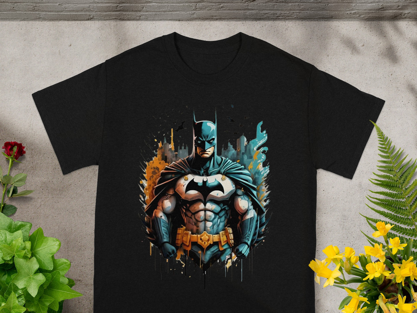 Black t-shirt with stylized Batman illustration and cityscape background.