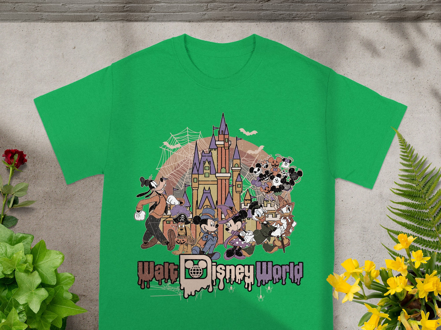 Green t-shirt with Walt Disney World Halloween characters and castle graphic.