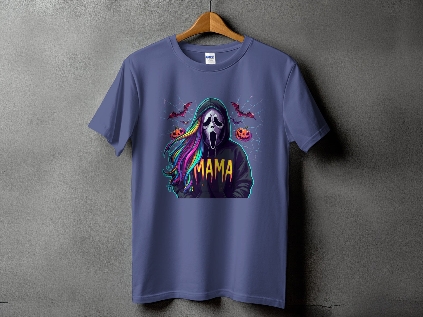 T-shirt with ghost face, rainbow hair, and "MAMA" text, bats, and pumpkins.