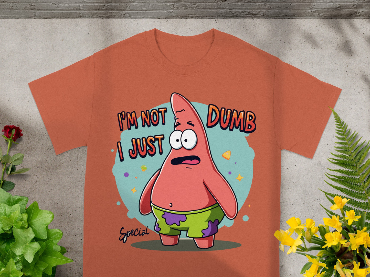 Orange t-shirt with Patrick Star saying "I'm not dumb, I'm just special."
