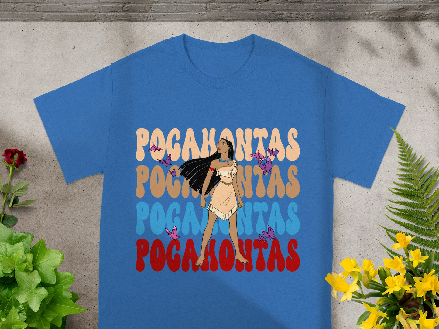 Blue t-shirt with "Pocahontas" text and illustration of a woman.