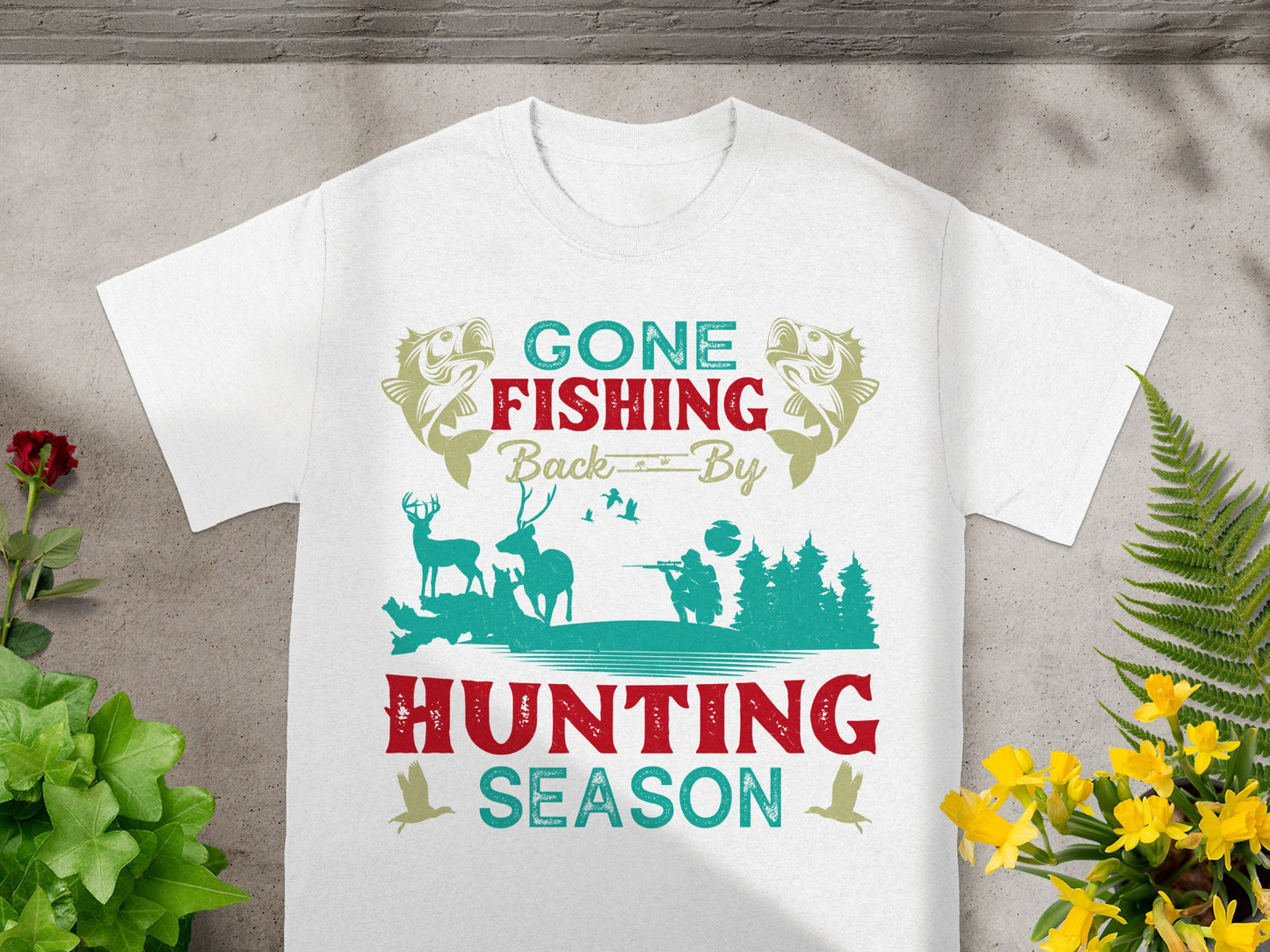 White t-shirt with "Gone Fishing Back By Hunting Season" text and graphics.