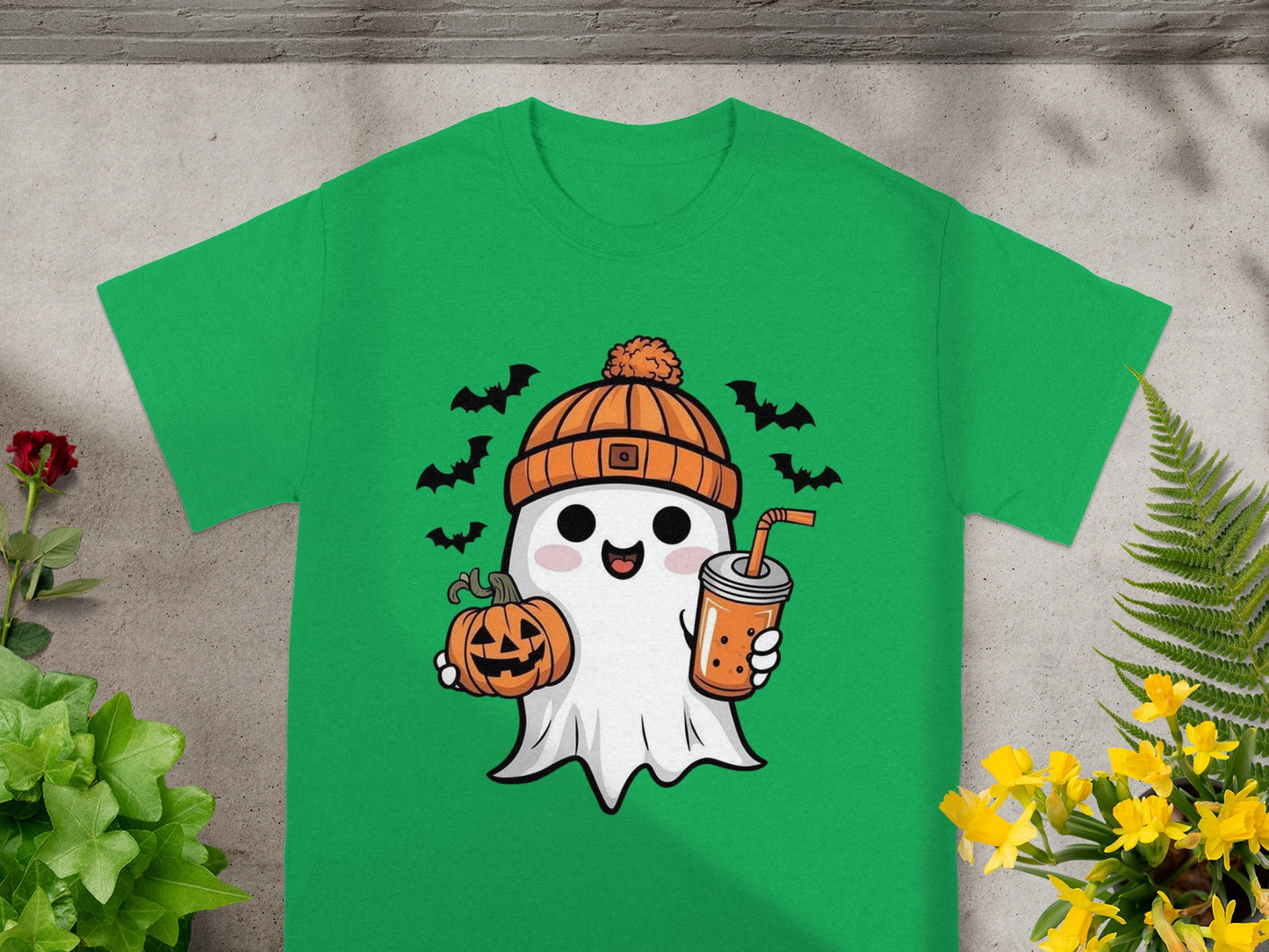 Cute ghost character in an orange beanie holding a pumpkin and drink with bats.