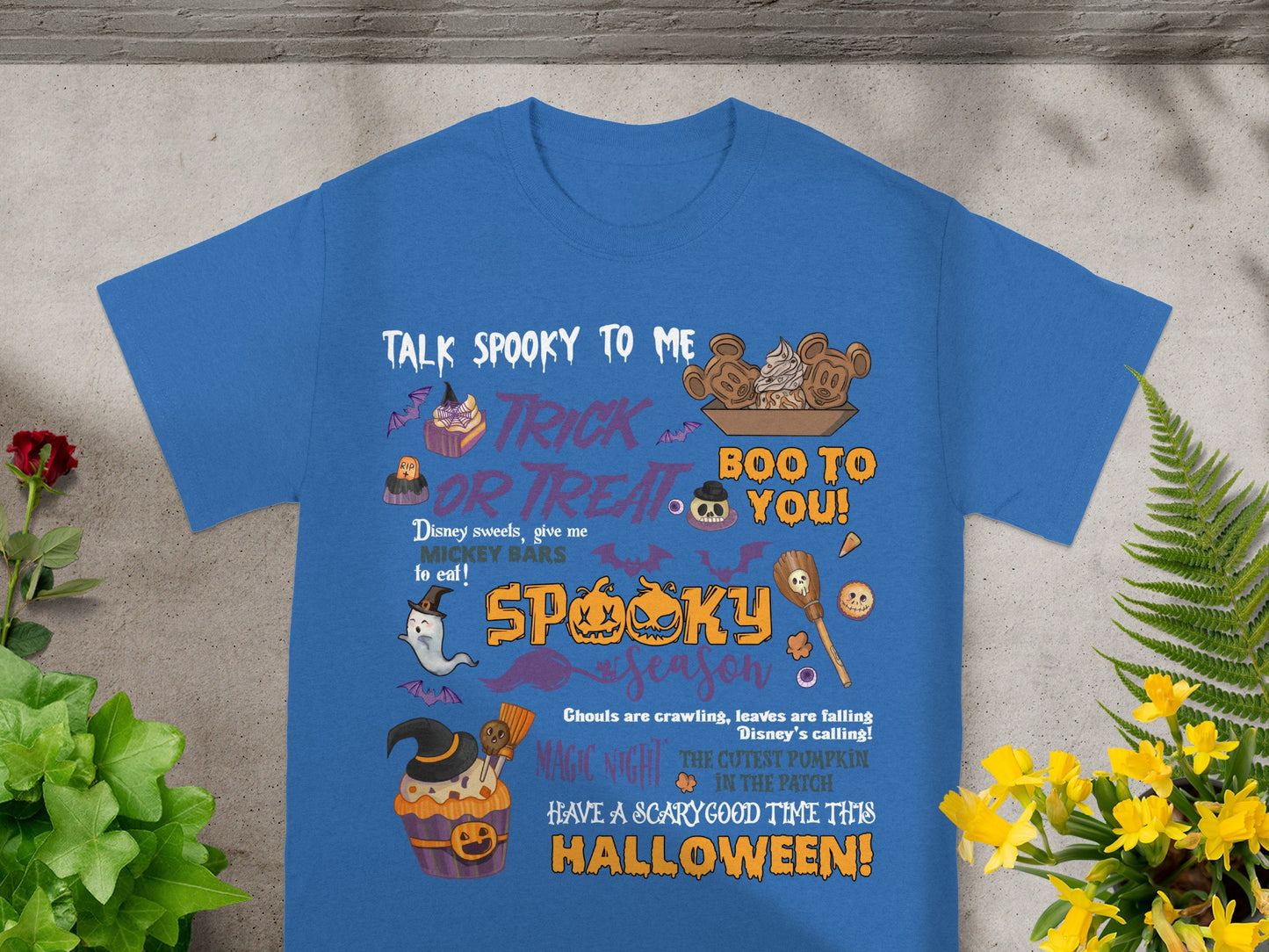 Blue t-shirt with Halloween graphics and text including "Talk Spooky to Me", "Trick or Treat", and "Boo to You".