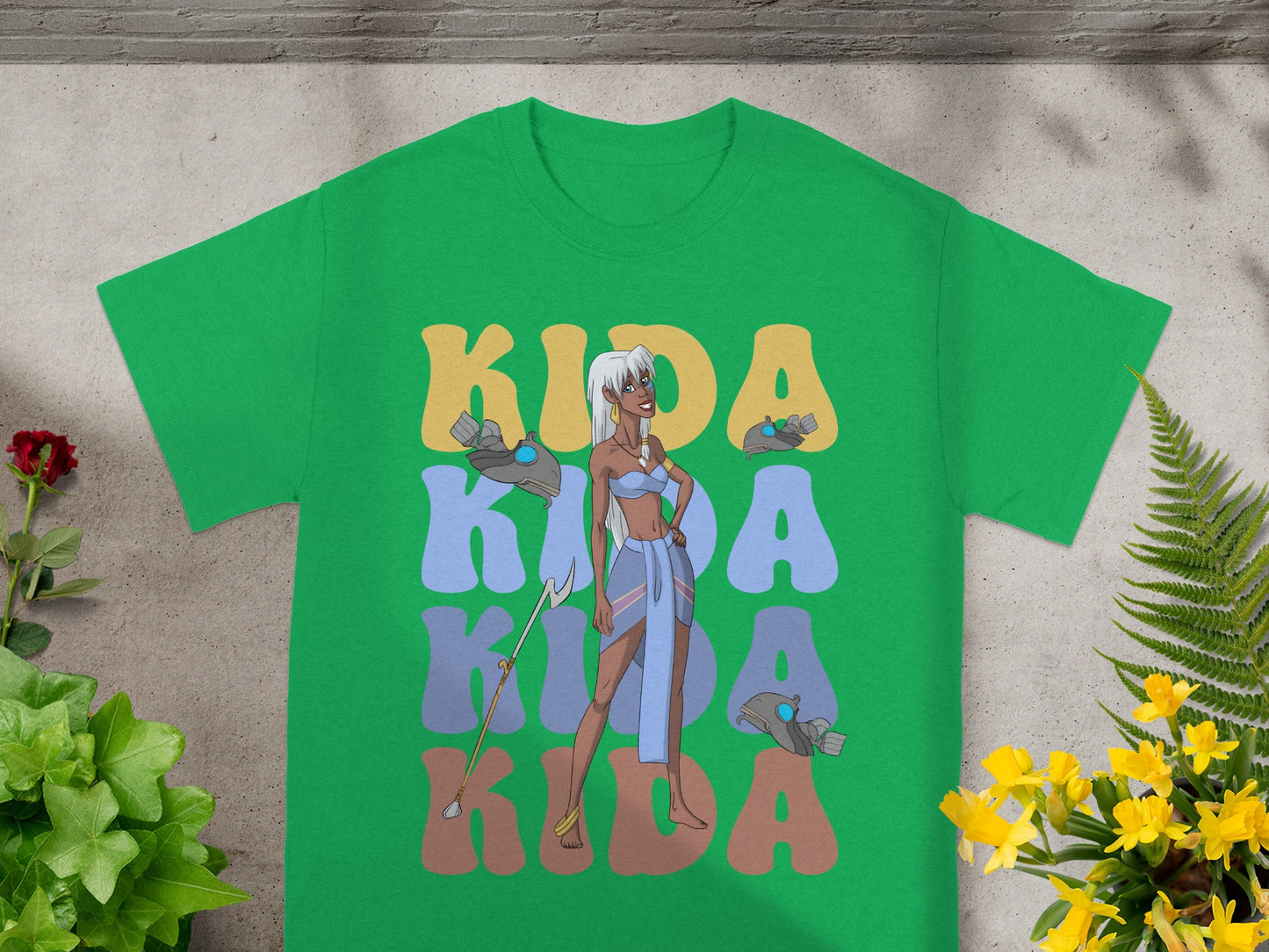 Kida graphic tee with "Kida" text in colorful block letters.