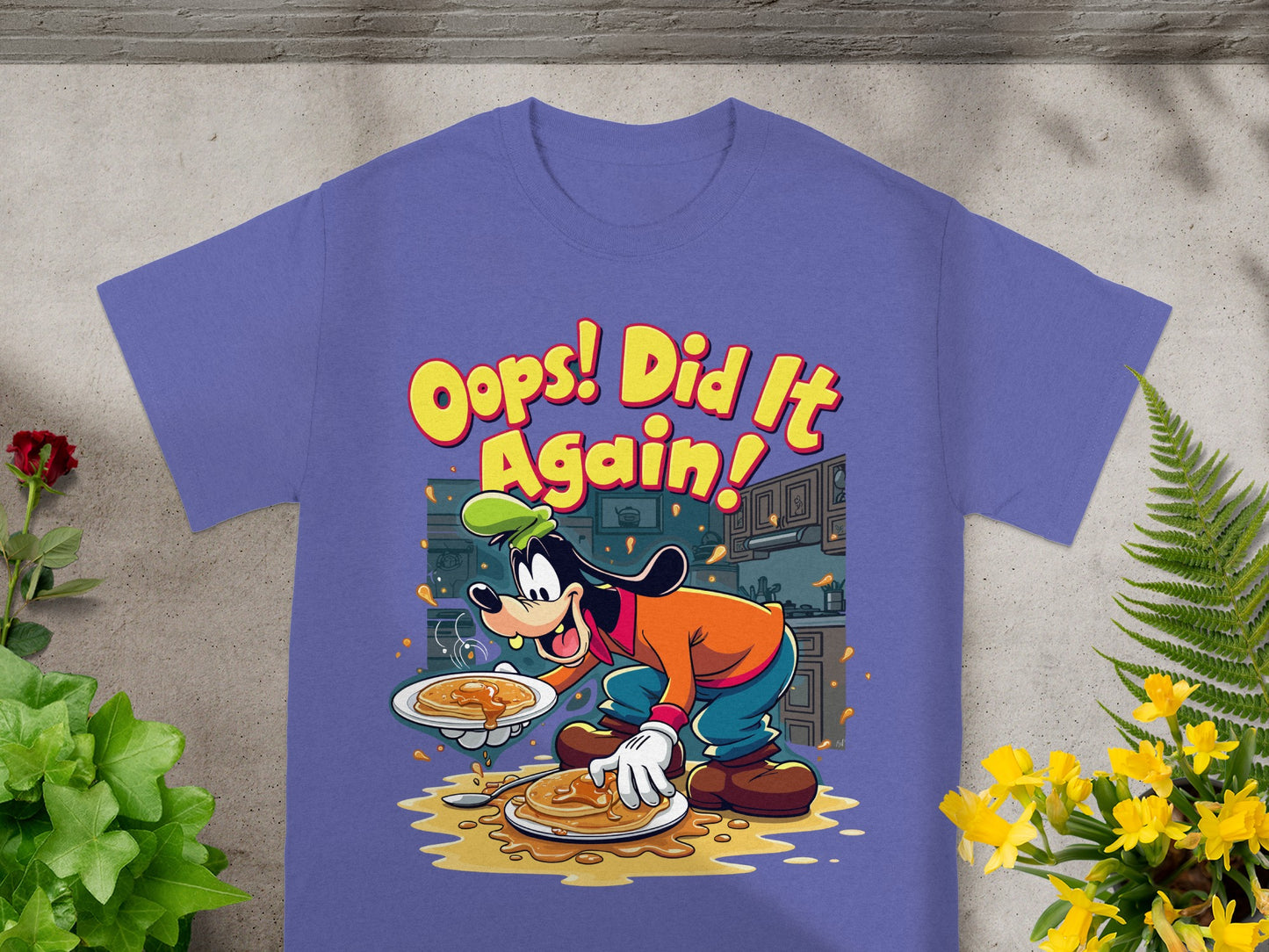 Goofy shirt with "Oops! Did It Again!" text and pancakes.