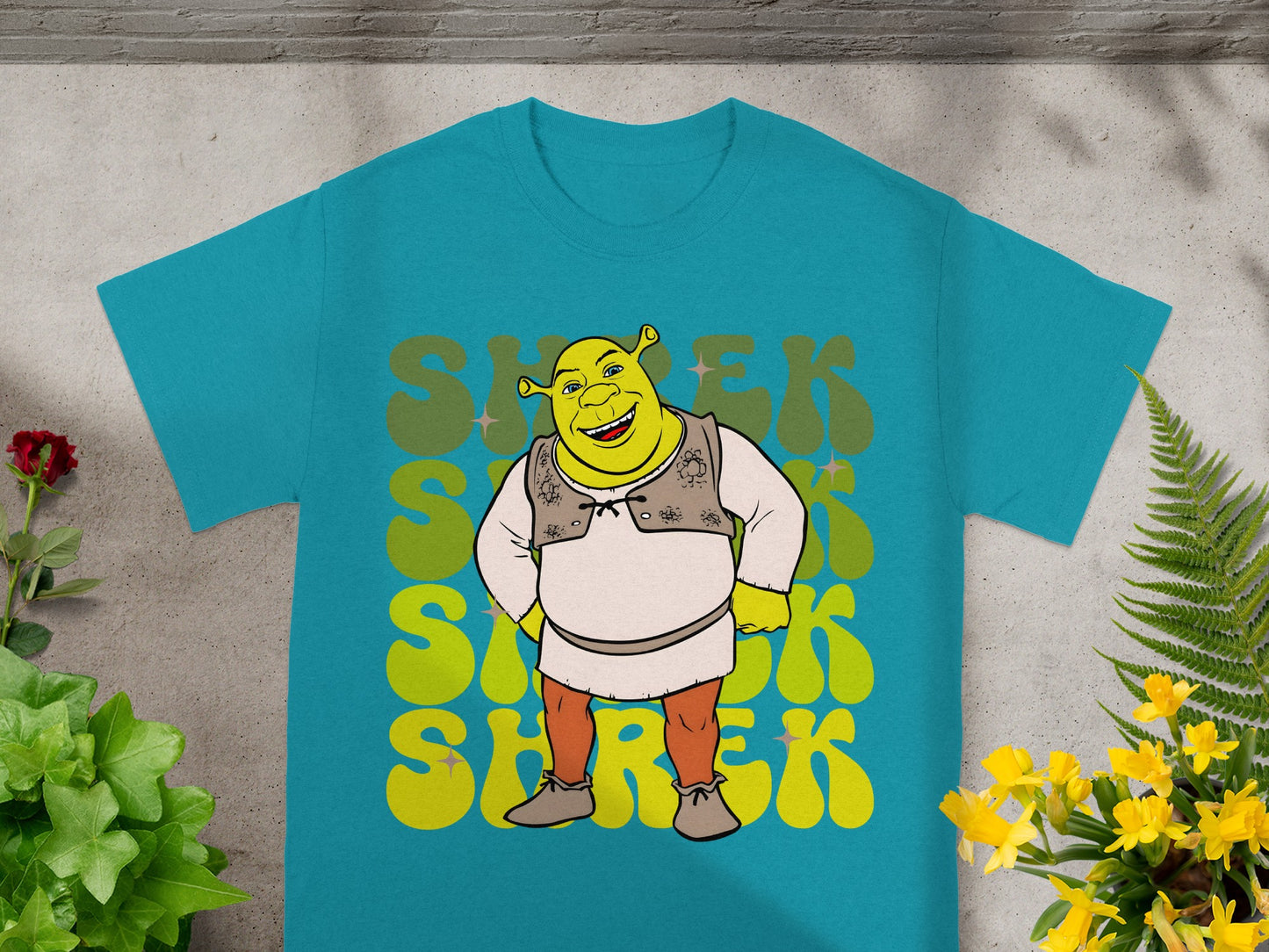Teal t-shirt with Shrek character and "SHREK" text in a retro font.