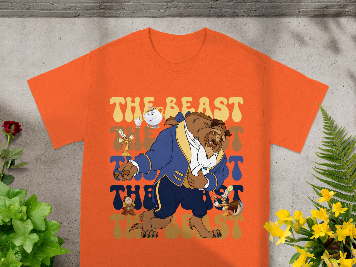 Orange t-shirt with Beast and Chip from Beauty and the Beast in groovy font.