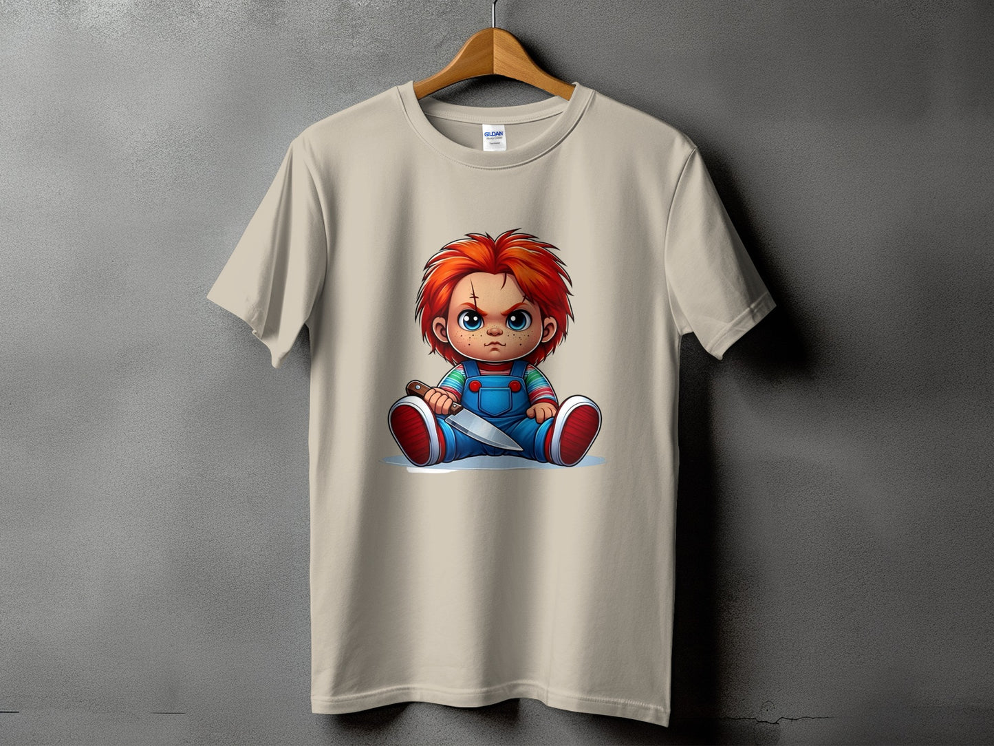 Light beige t-shirt featuring Chucky doll with knife, sitting down.
