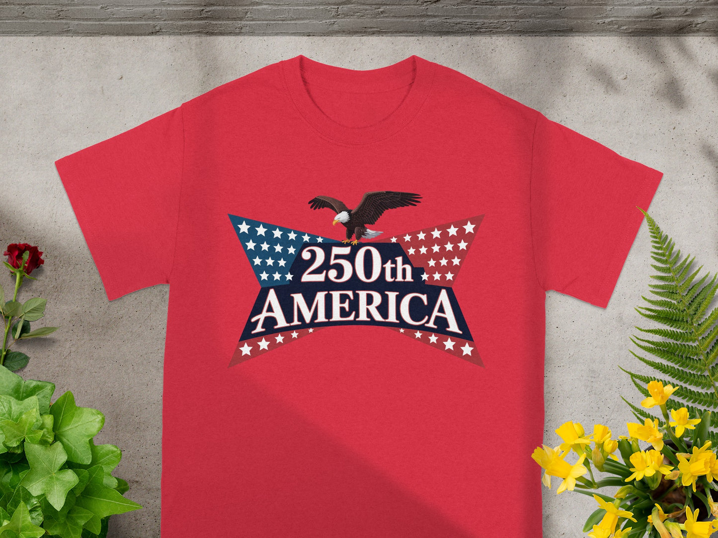 Red t-shirt with "250th AMERICA" text on a star-spangled banner graphic.