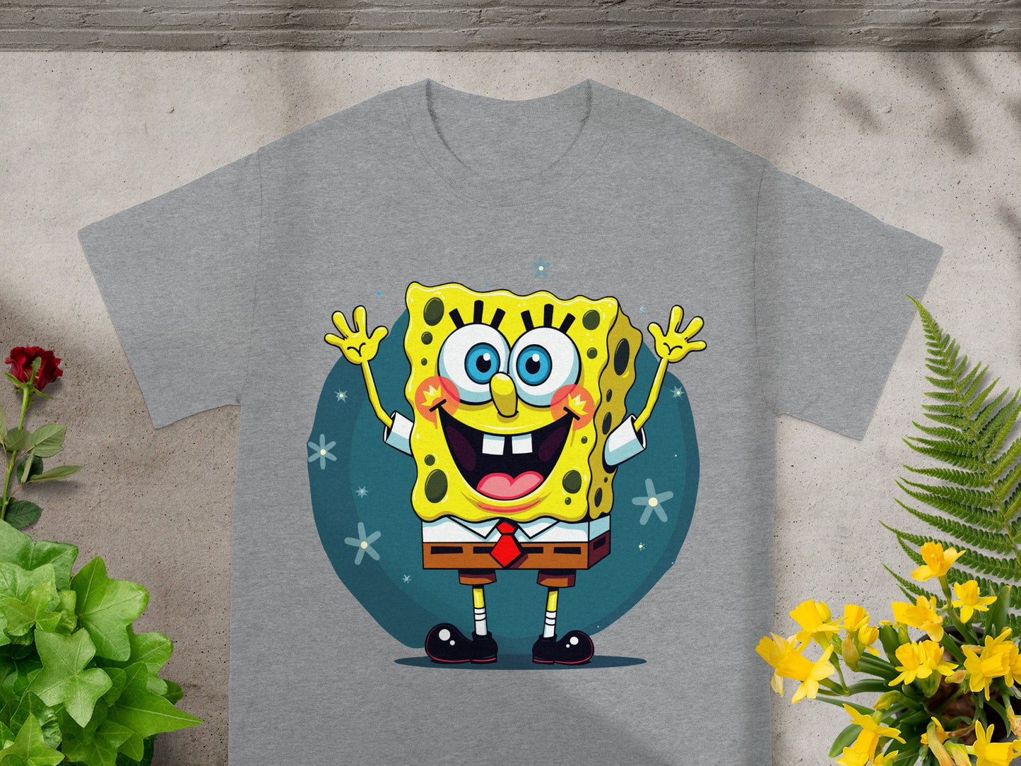 Gray t-shirt with Spongebob Squarepants character smiling and waving.
