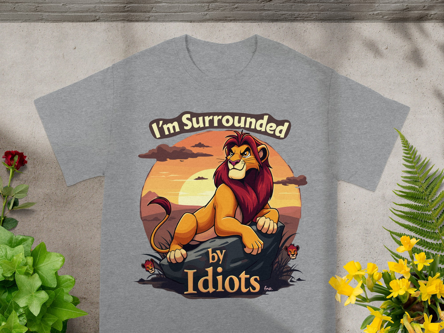 Grey t-shirt with a lion and text "I'm Surrounded by Idiots."