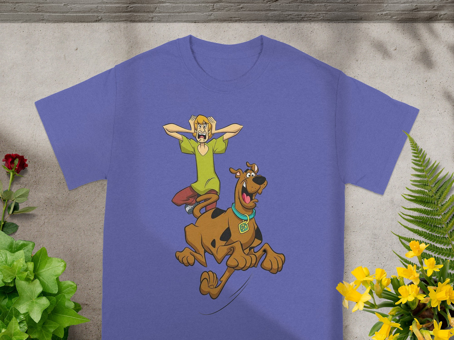 Purple t-shirt with Scooby-Doo and Shaggy running in fear.