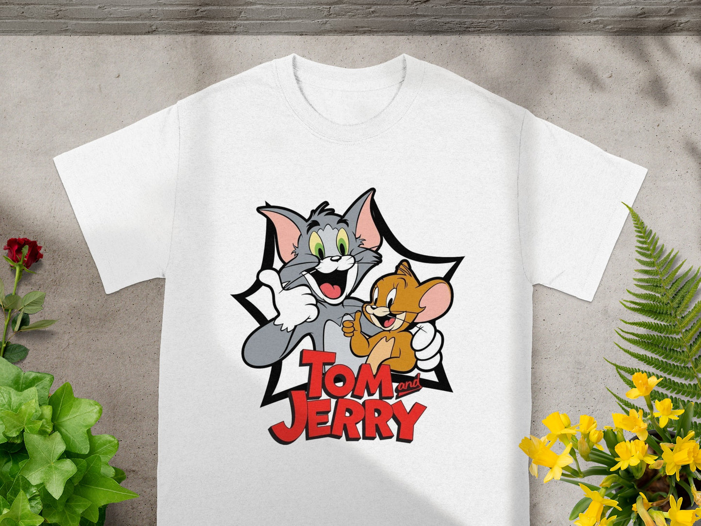 White t-shirt with Tom and Jerry graphic.