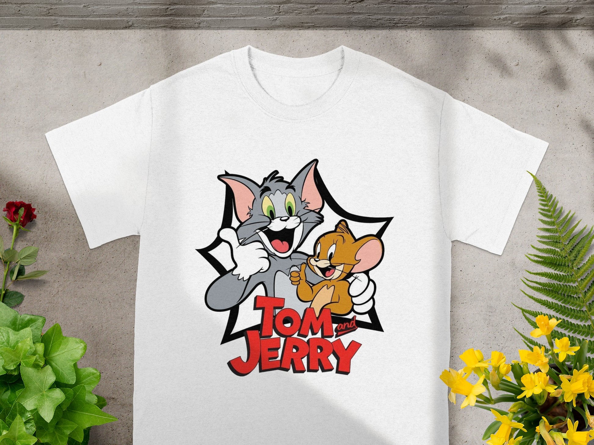 White t-shirt with Tom and Jerry graphic.