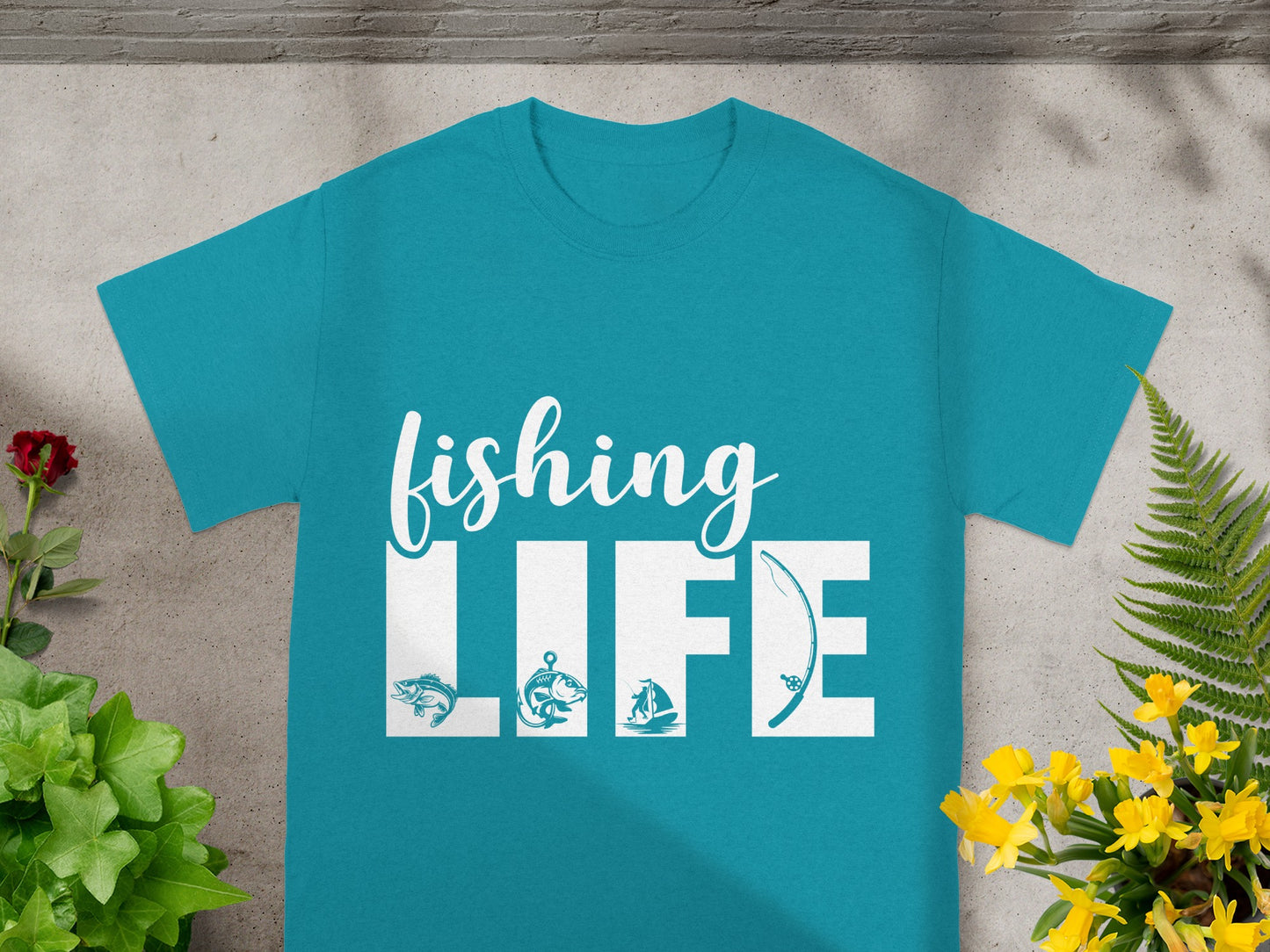Teal t-shirt with white text "fishing LIFE" and fishing-related graphics.