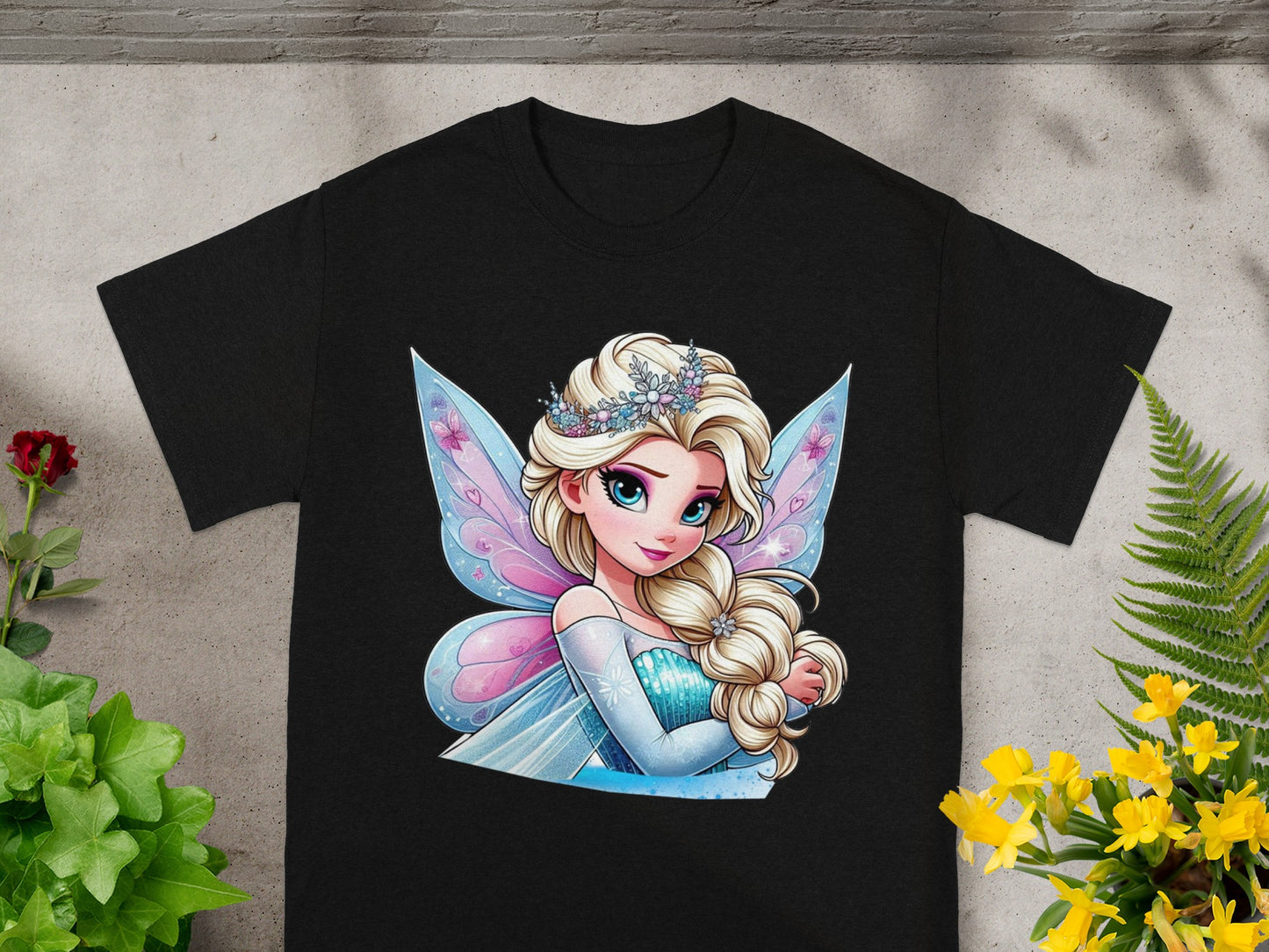 Black t-shirt with illustration of Elsa from Frozen wearing a crown and fairy wings.