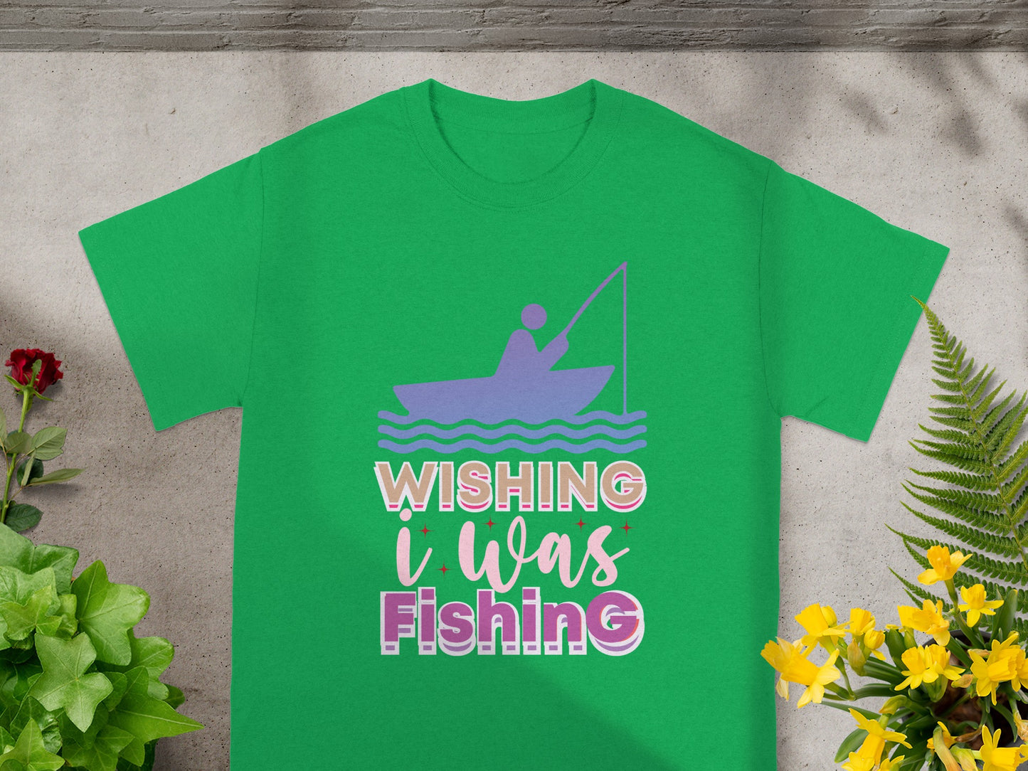 Green t-shirt with "Wishing I Was Fishing" graphic and a fisherman in a boat silhouette.