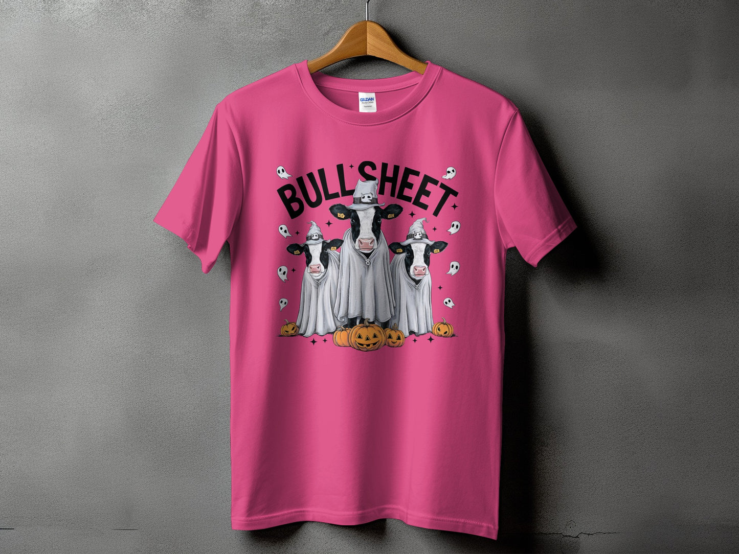 Pink t-shirt with "Bull Sheet" text and cows in ghost costumes.