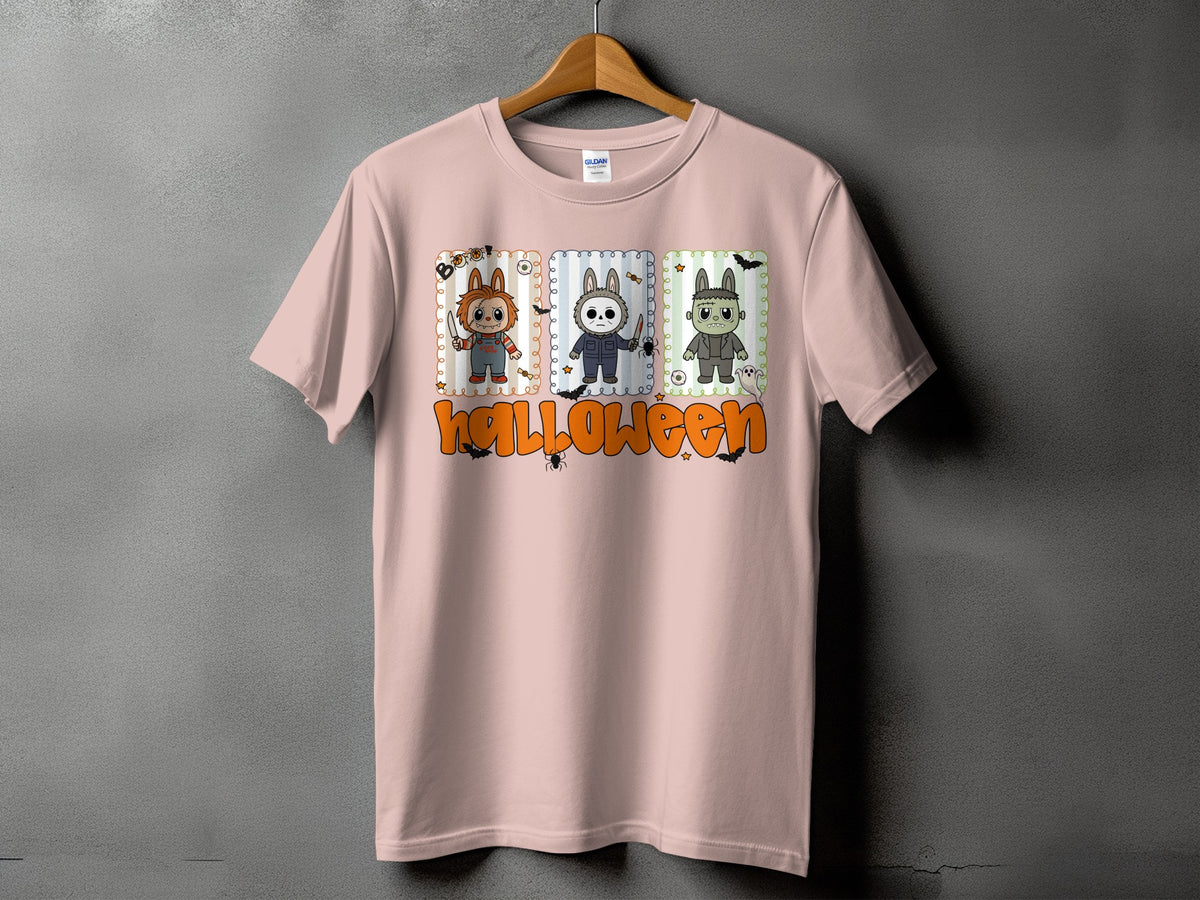 Pink t-shirt with three cartoon characters and "Halloween" text.