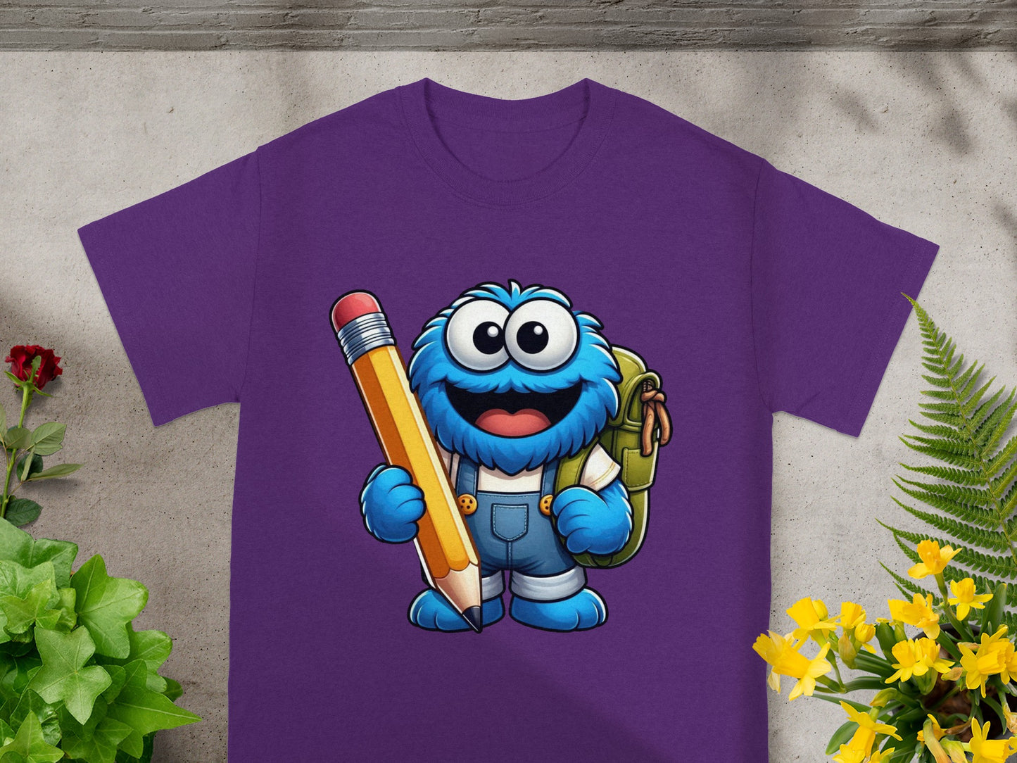 Blue furry monster with backpack and pencil on purple t-shirt.
