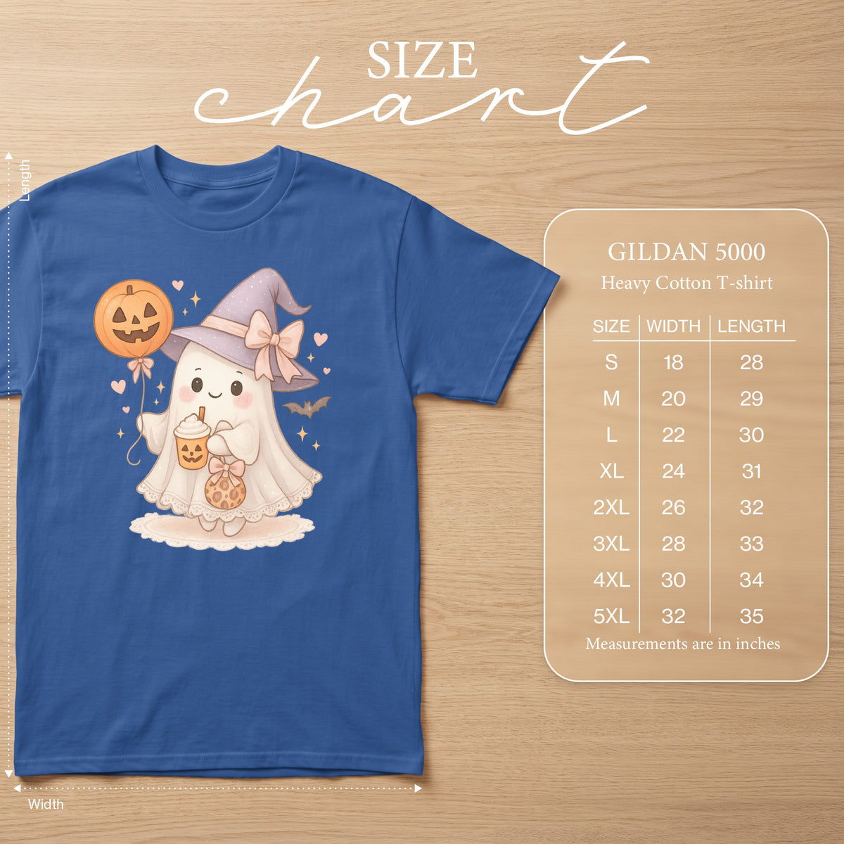Blue t-shirt with a cute ghost wearing a witch hat, holding a pumpkin balloon. Size chart included.