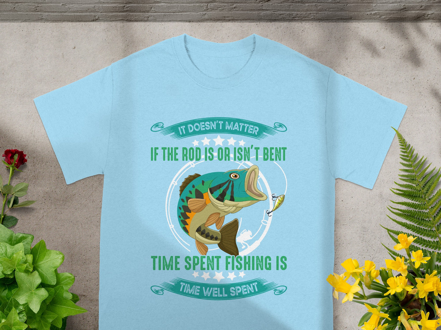 Light blue t-shirt with a fish jumping for a lure and fishing-themed text.