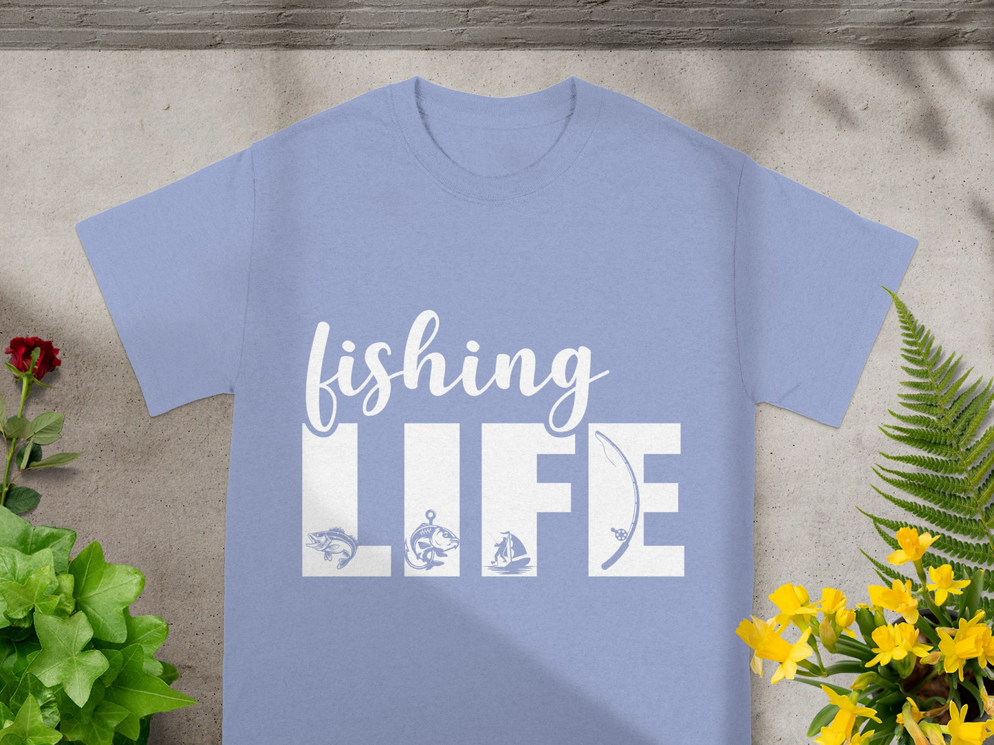 Light blue t-shirt with white text and fishing graphics.