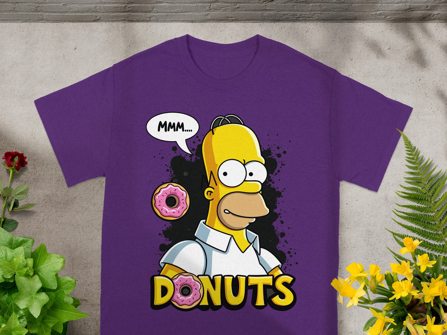 Homer Simpson eating a donut, with "MMM...." text above.