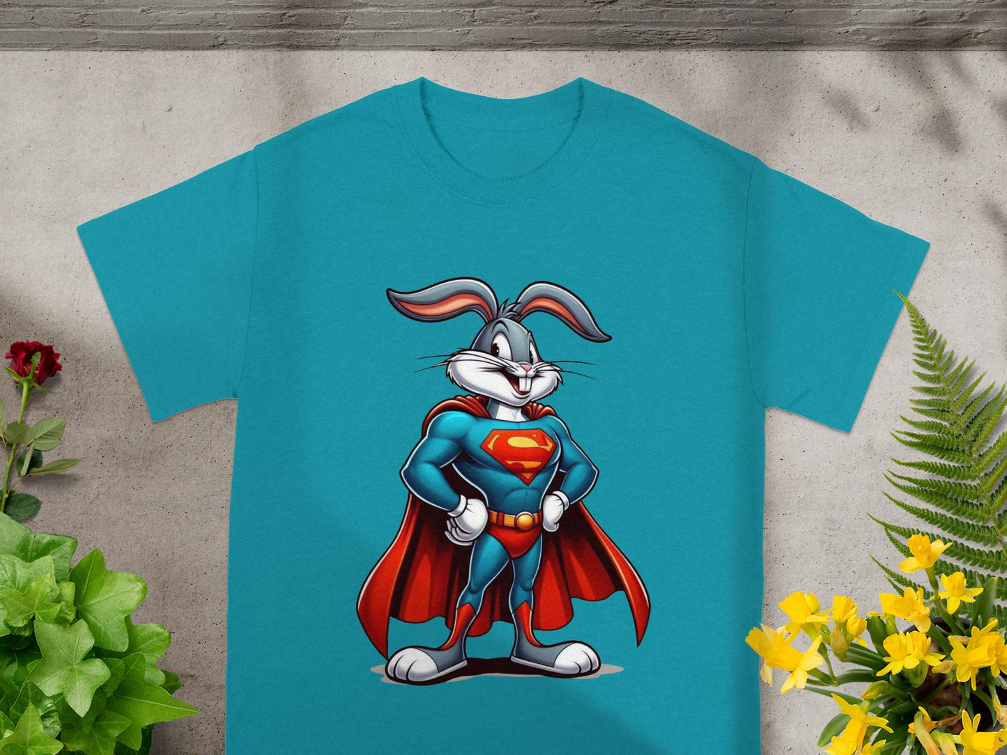 Bugs Bunny dressed as Superman on blue t-shirt.