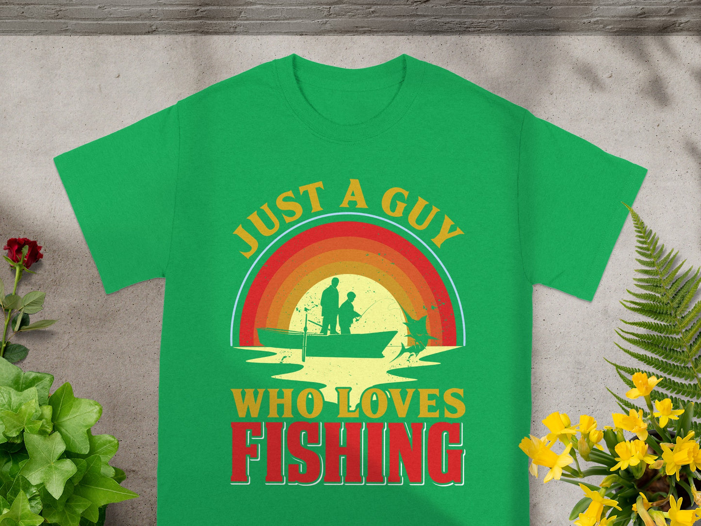 Green t-shirt with "JUST A GUY WHO LOVES FISHING" text and fishing graphic.