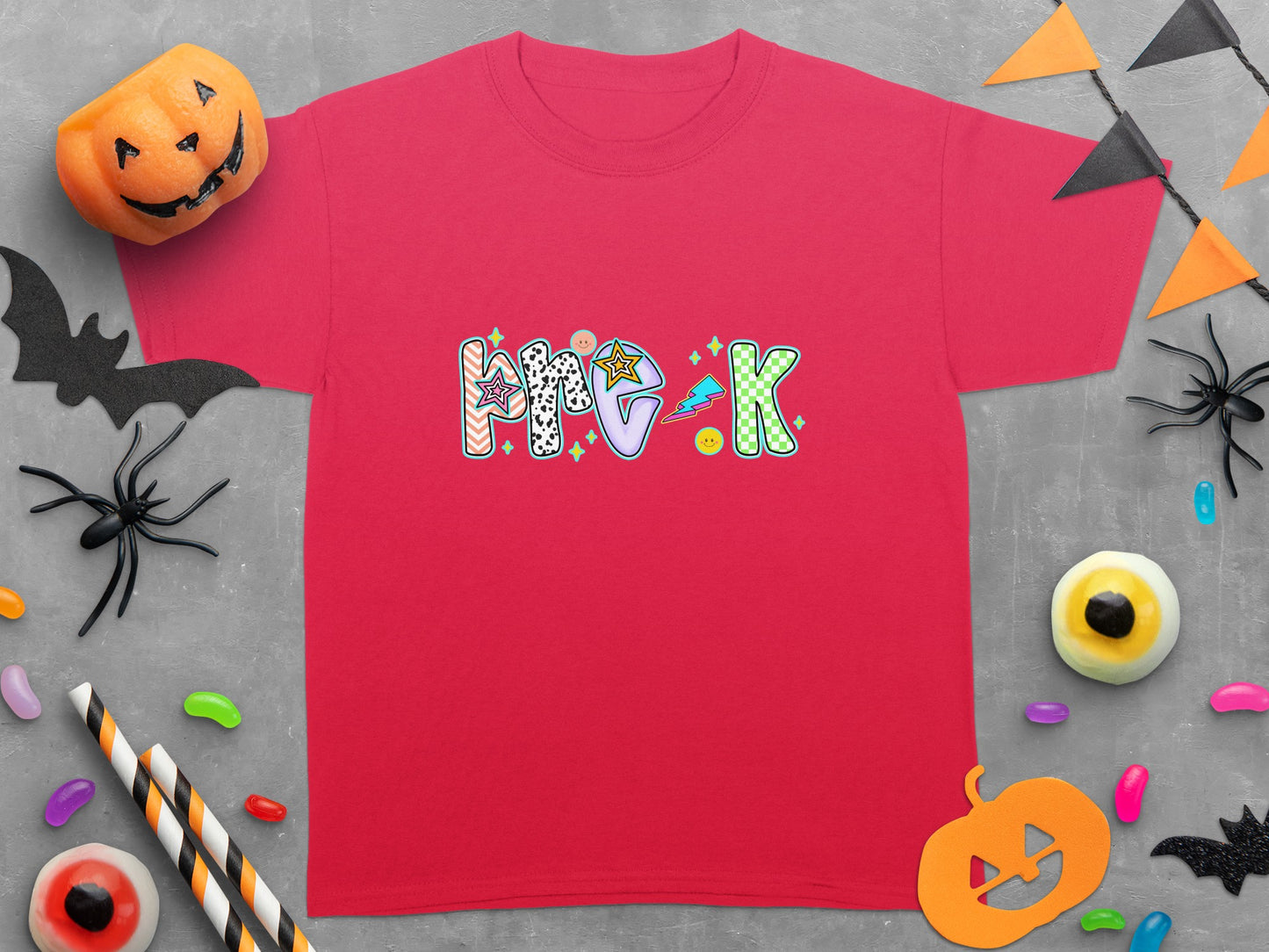 Red t-shirt with "Pre-K" text in colorful, playful Halloween-themed font.