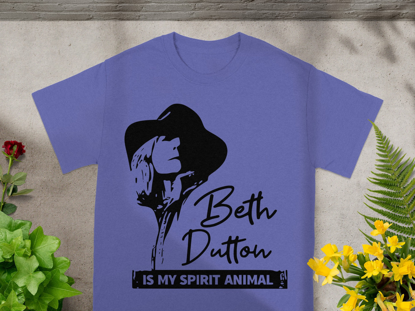 Purple t-shirt with Beth Dutton graphic and spirit animal text.