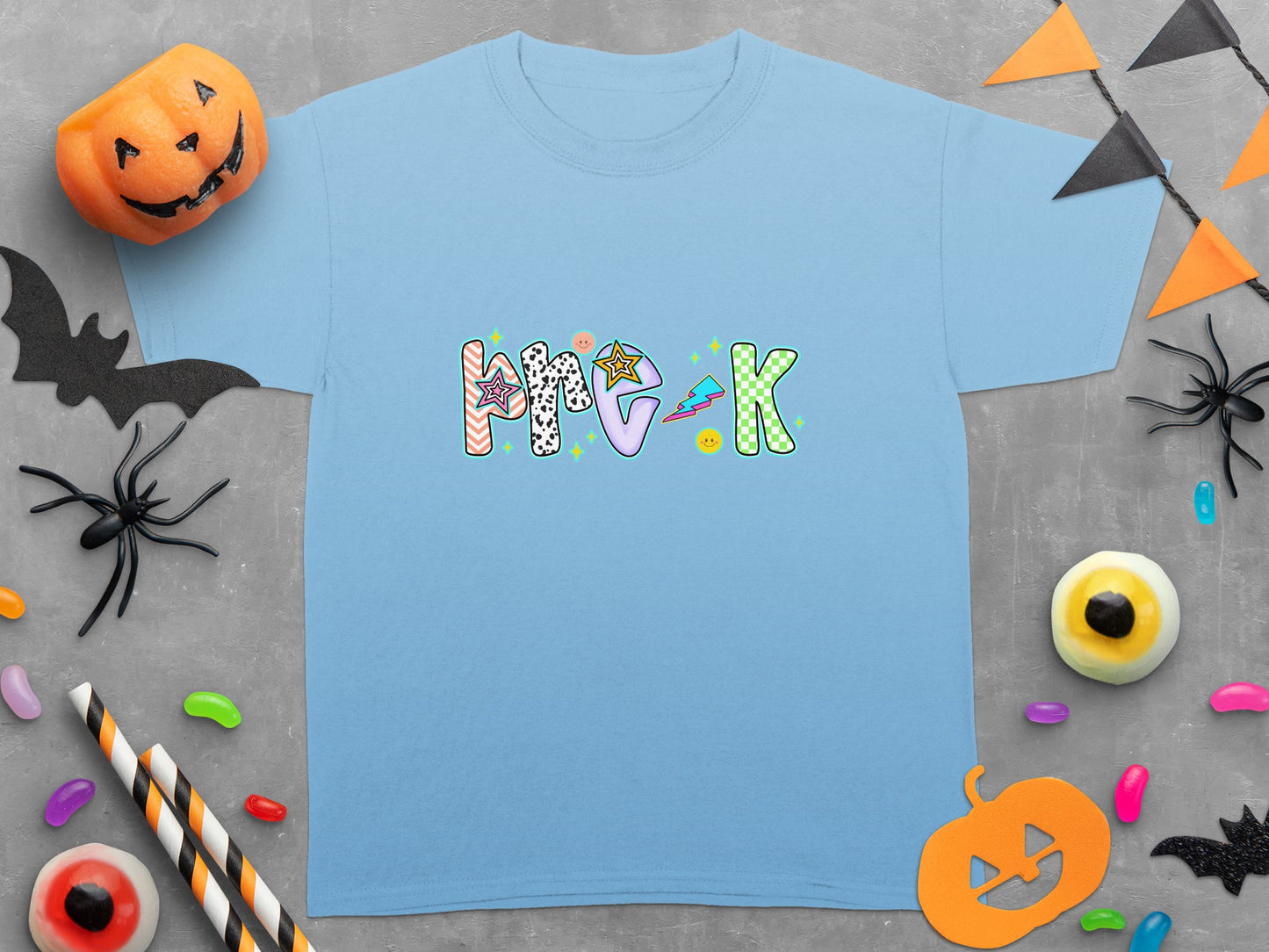 Light blue t-shirt with colorful "Pre-K" lettering and Halloween decorations.