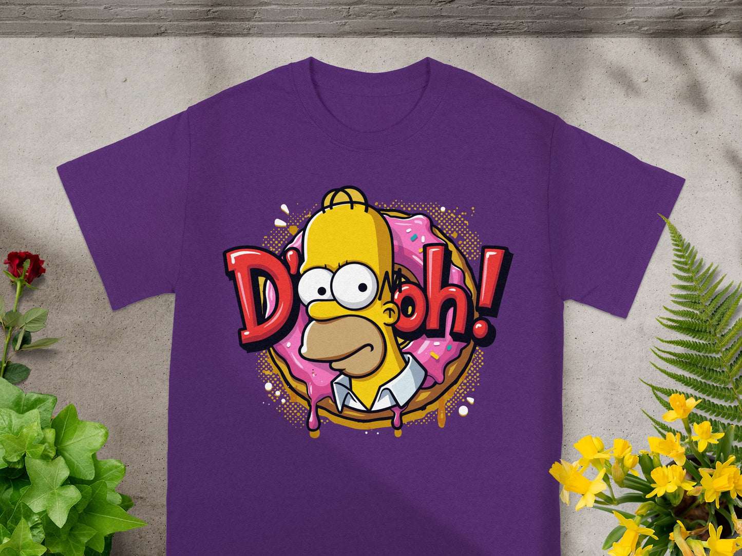Homer Simpson's "D'oh!" with a pink donut on a purple t-shirt.