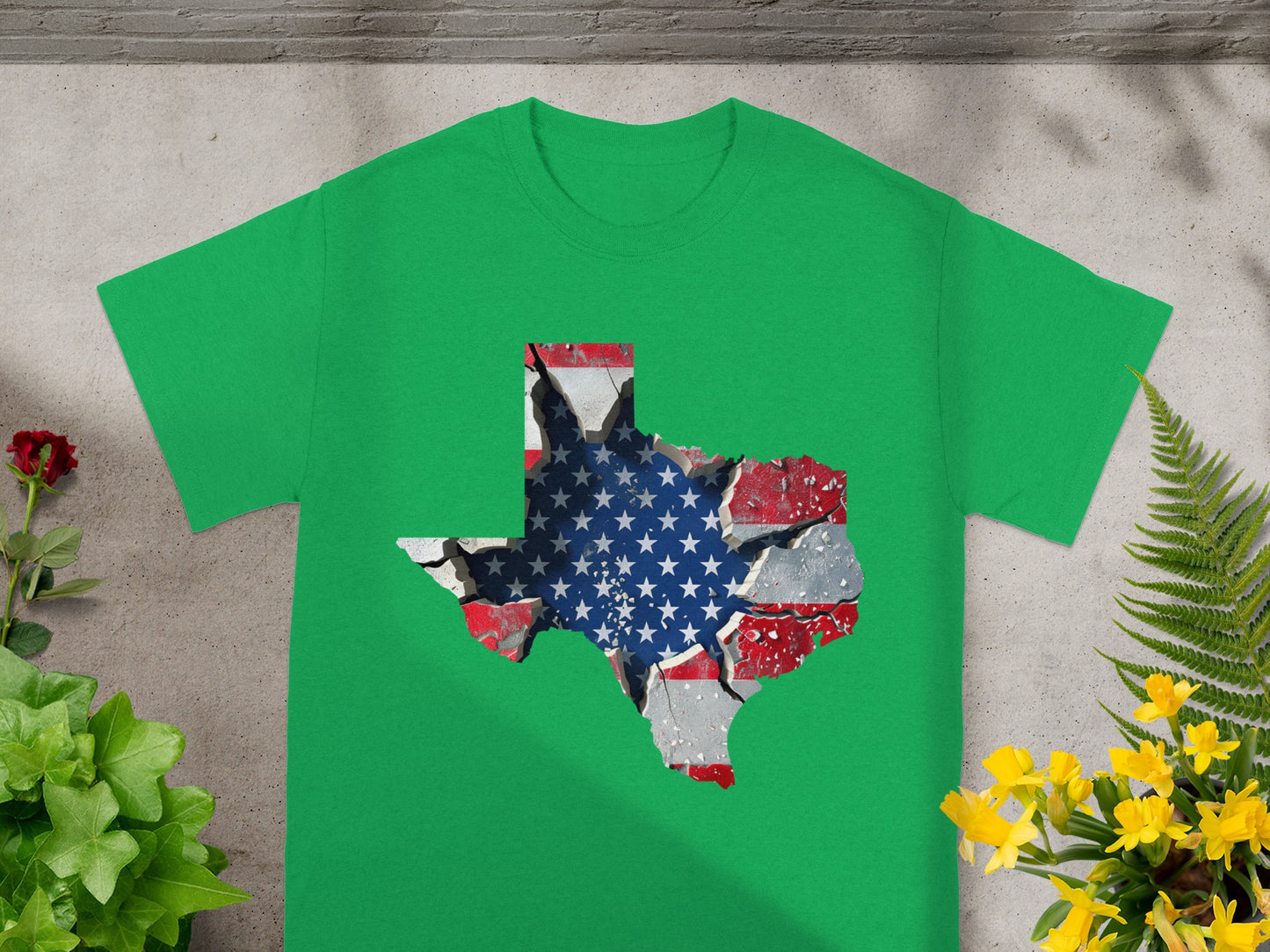 Green t-shirt with a cracked Texas outline filled with the American flag.