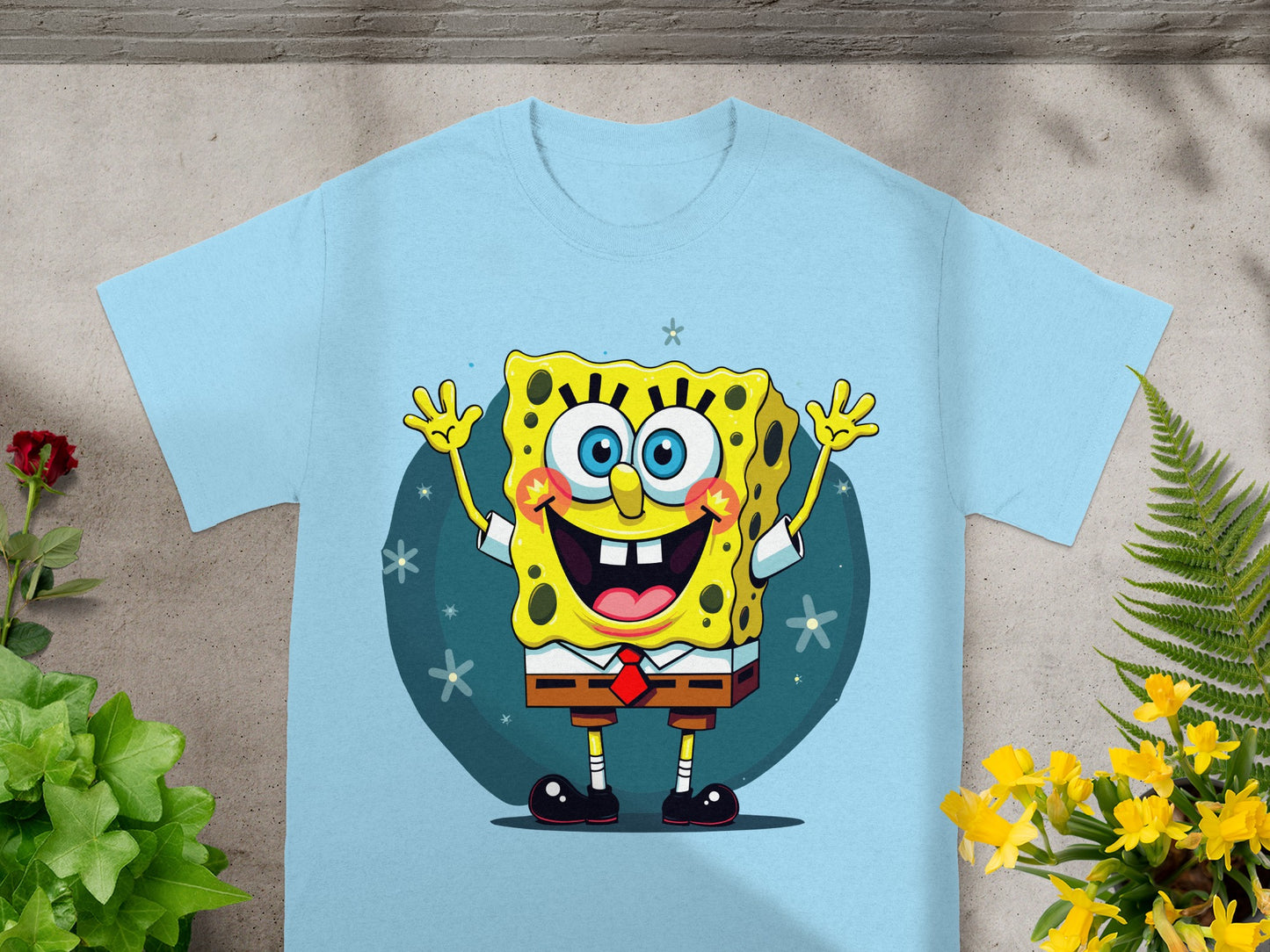 Light blue t-shirt with Spongebob Squarepants smiling and waving.