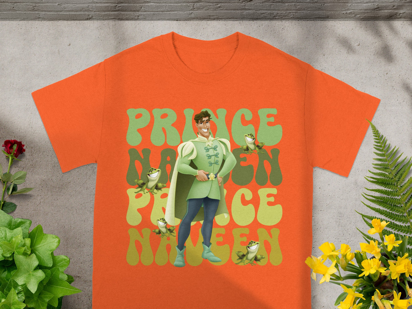 Orange t-shirt with "Prince Nineteen" and Kermit the Frog graphic.