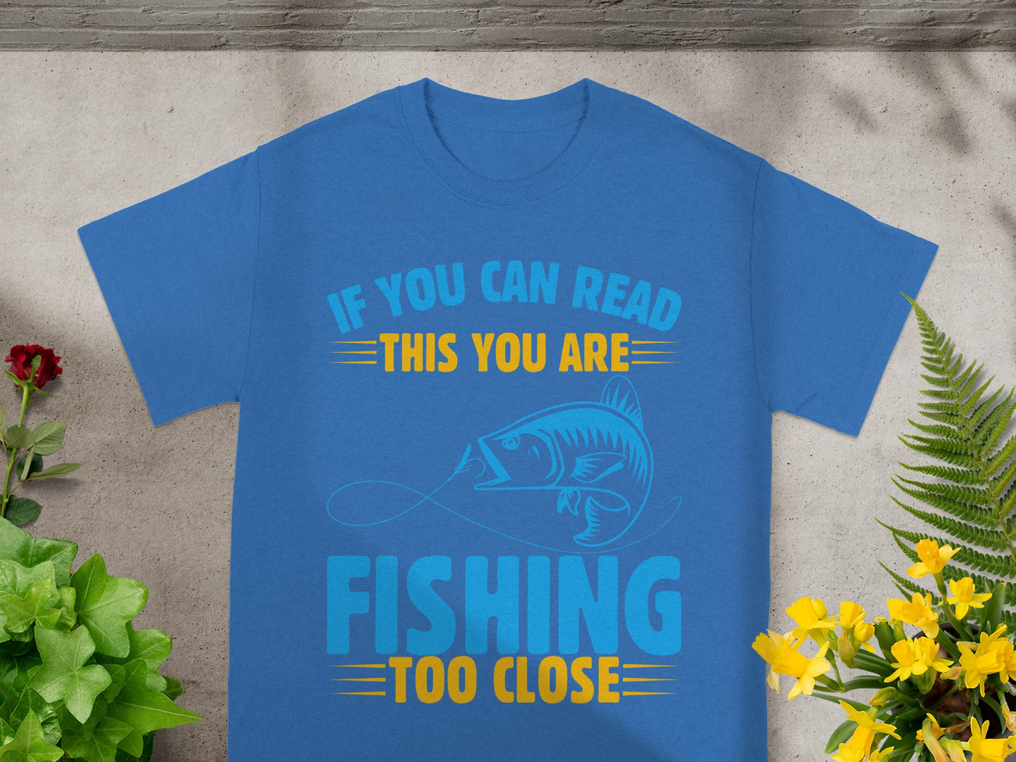Blue t-shirt with blue text "IF YOU CAN READ THIS YOU ARE FISHING TOO CLOSE".
