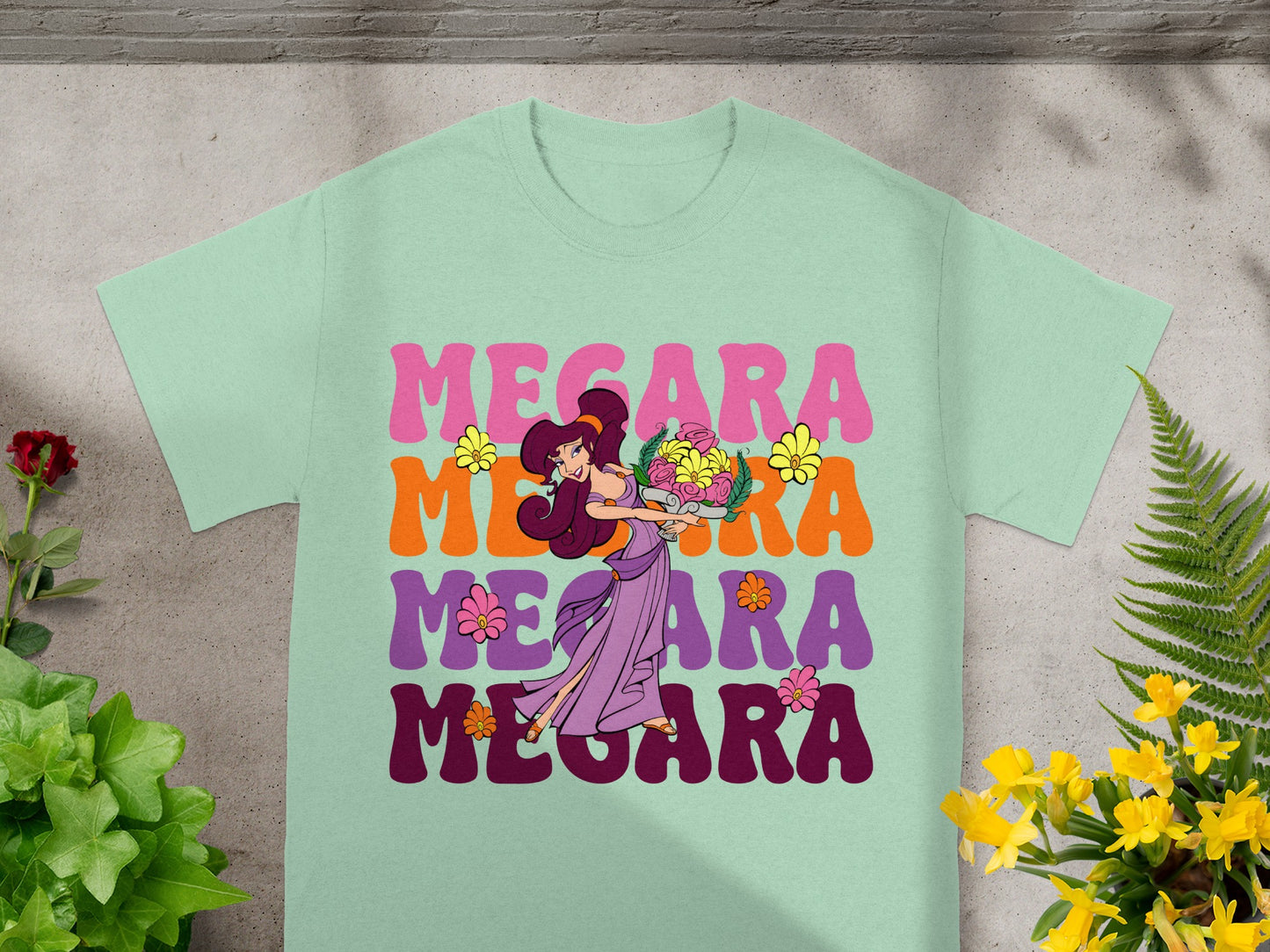 Megara in purple dress holding flowers with colorful text.